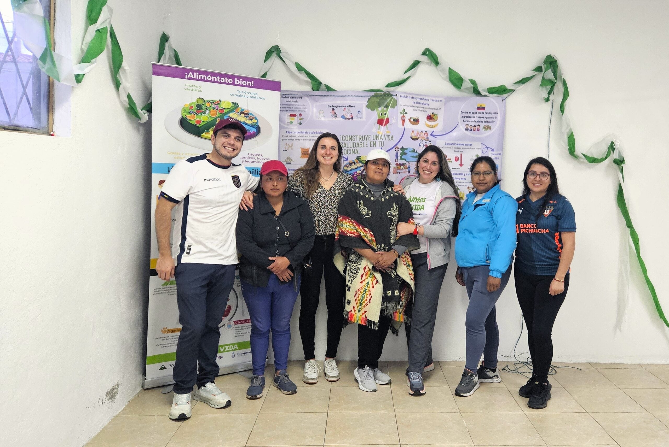 Our proud team in Guaytacama with a dedicated mother who stayed late to help prepare for the next day.